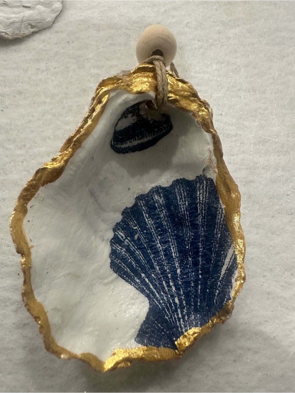 Handmade White and Gold oyster Shell ornament with Blue Shell Print
